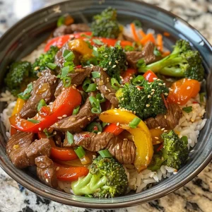A side view of tender beef stir fry, showcasing its rich colors and textures.