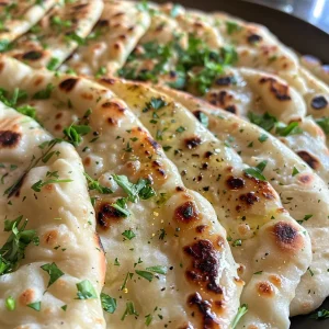 Detailed image of a soft Turkish flatbread, highlighting the creaminess of Greek yogurt and its golden crust.