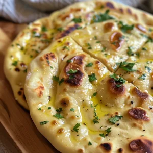 Texture detail of a freshly made flatbread highlighting its crispy edges and tender center.
