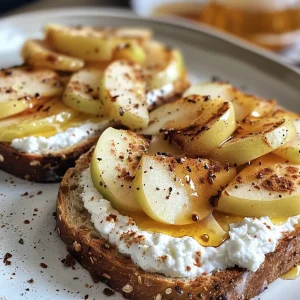 Detailed shot of a delicious ricotta toast featuring Granny Smith apples and honey glaze.